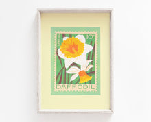 Framed daffodil print on wall